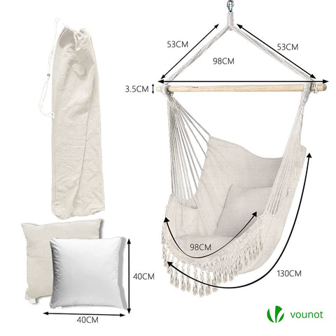 Beige vounot hanging chair with wooden bar macrame hammock swing chair with matching fringed cushions for indoor outdoor use