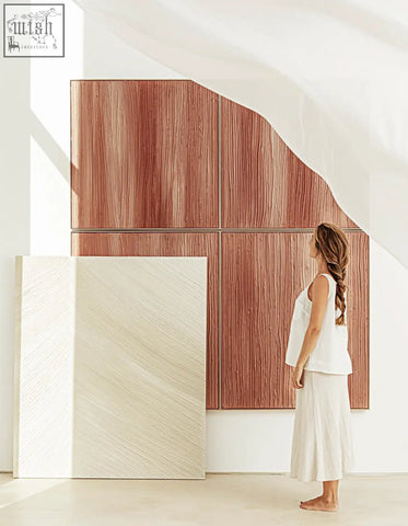 A woman stands beside walburga wall art background panels in warm wood grain and soft beige textures with low shipping cost