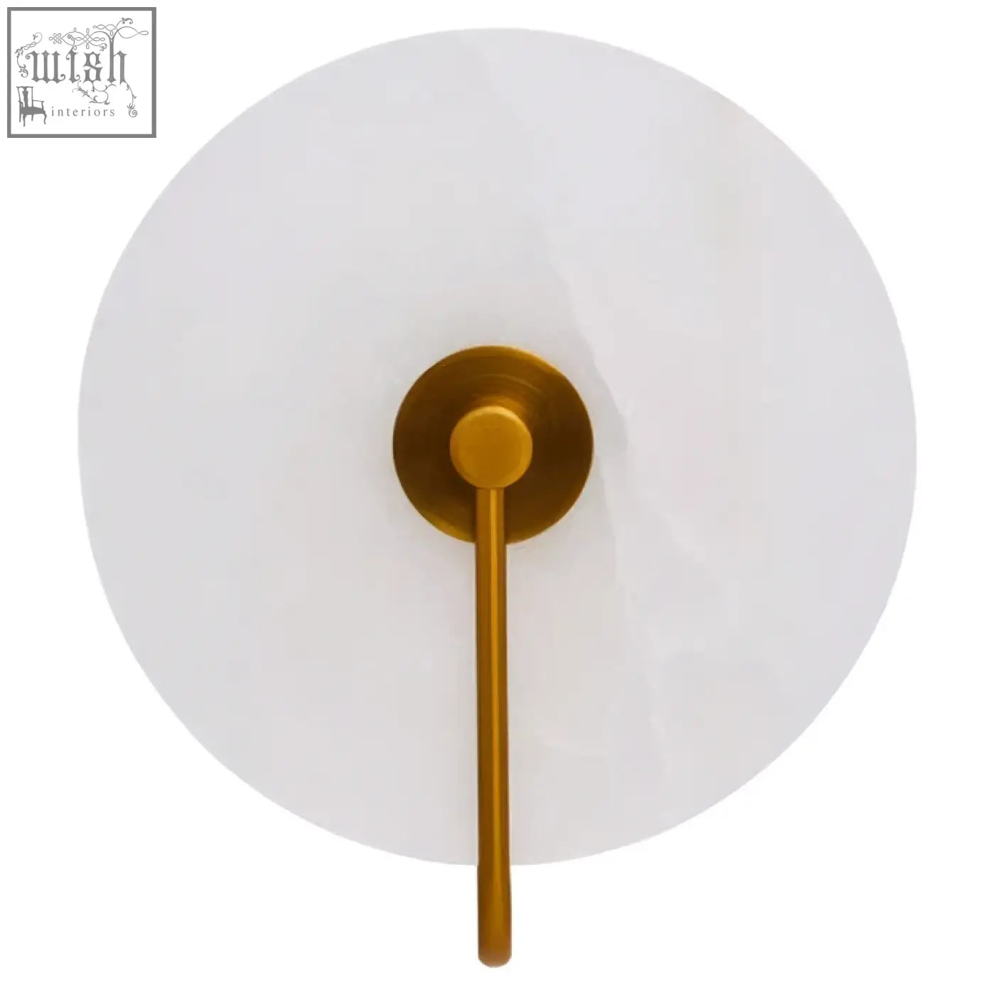 Gold-toned waldorf white marble wall light with circular frosted glass shade and slender stem on marble wall