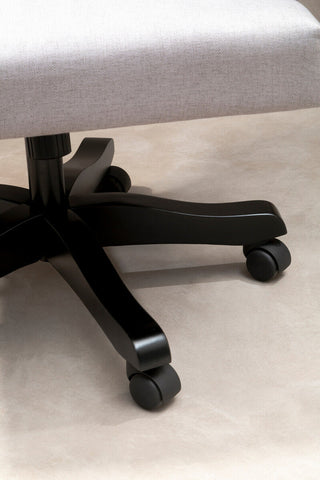 Black five-star base with casters under light grey upholstered walford grey home office chair for home office use