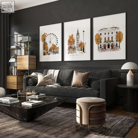 Dark gray upholstered sofa with beige and taupe pillows below autumn day in london travel prints wall art decor living room set of 3
