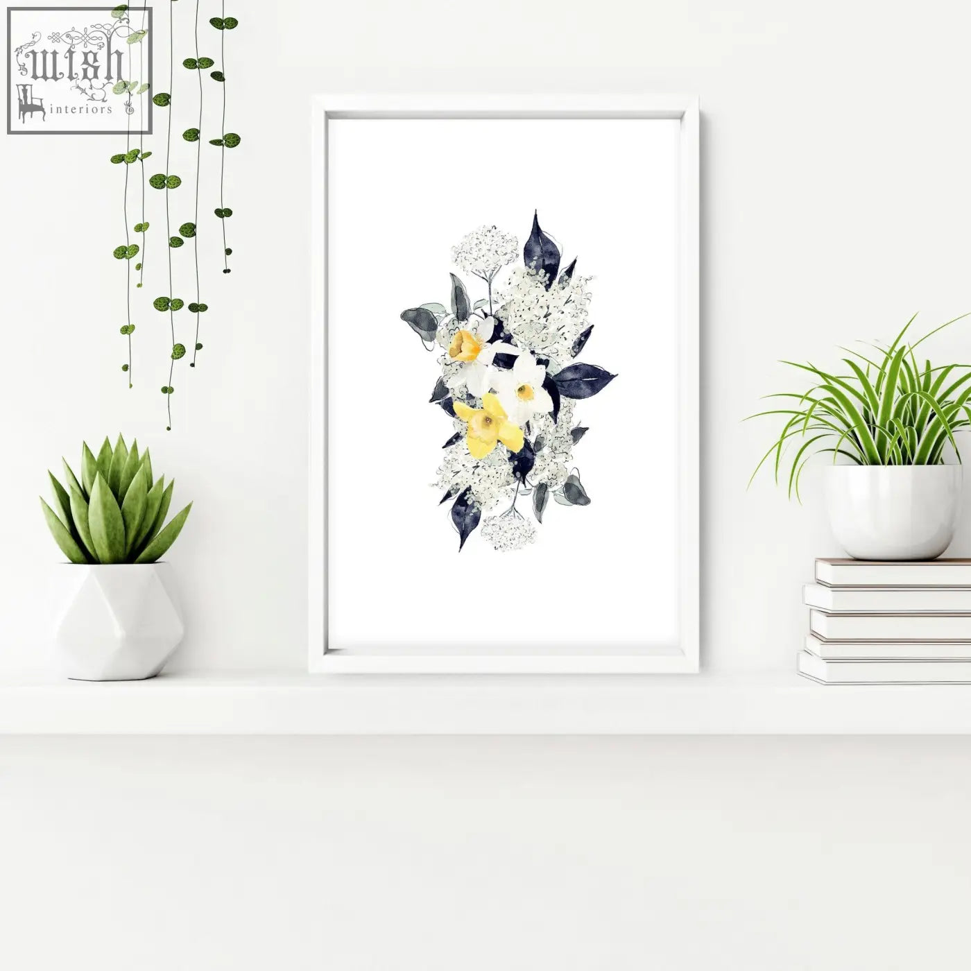A framed watercolor floral wall art print with white and yellow blossoms in a white frame perfect for bathroom walls