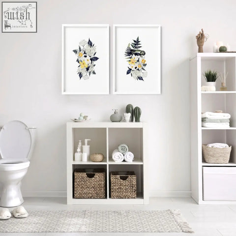 White framed wall art prints with yellow and navy floral illustrations perfect for bathroom walls set of 2