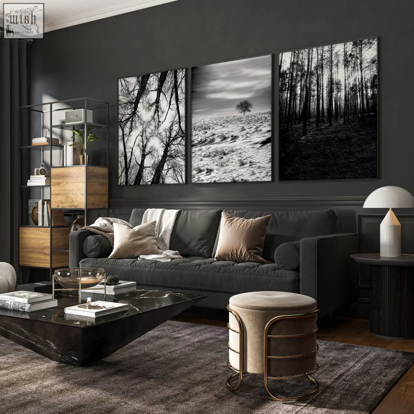Dark gray velvet sofa with beige and white throw pillows in living room with black and white forest wall art on grey walls living