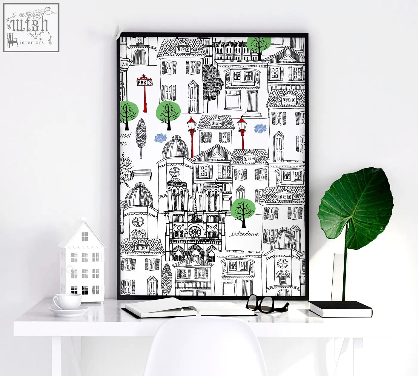 Black-framed wall art paris poster with hand-drawn black and white buildings, green trees, red lamps, and labeled landmarks