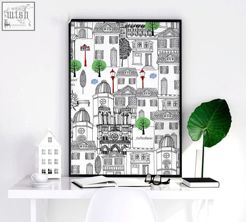 Black-framed wall art paris poster with hand-drawn black and white buildings, green trees, red lamps, and labeled landmarks