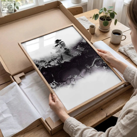 Minimalist black and white abstract landscape print in light wood frame perfect for high ceiling living room wall decor
