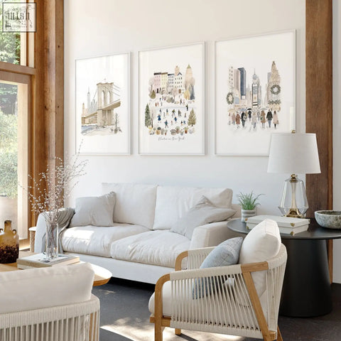 Three framed beige pastel watercolor cityscape prints of new york hanging on wall perfect for living room wall decor ideas
