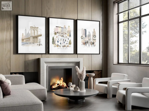 Three beige pastel nyc travel art prints hang above the fireplace for stylish living room wall decor ideas