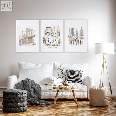 Three framed beige pastel watercolor prints of winter nyc scenes perfect for living room wall decor ideas