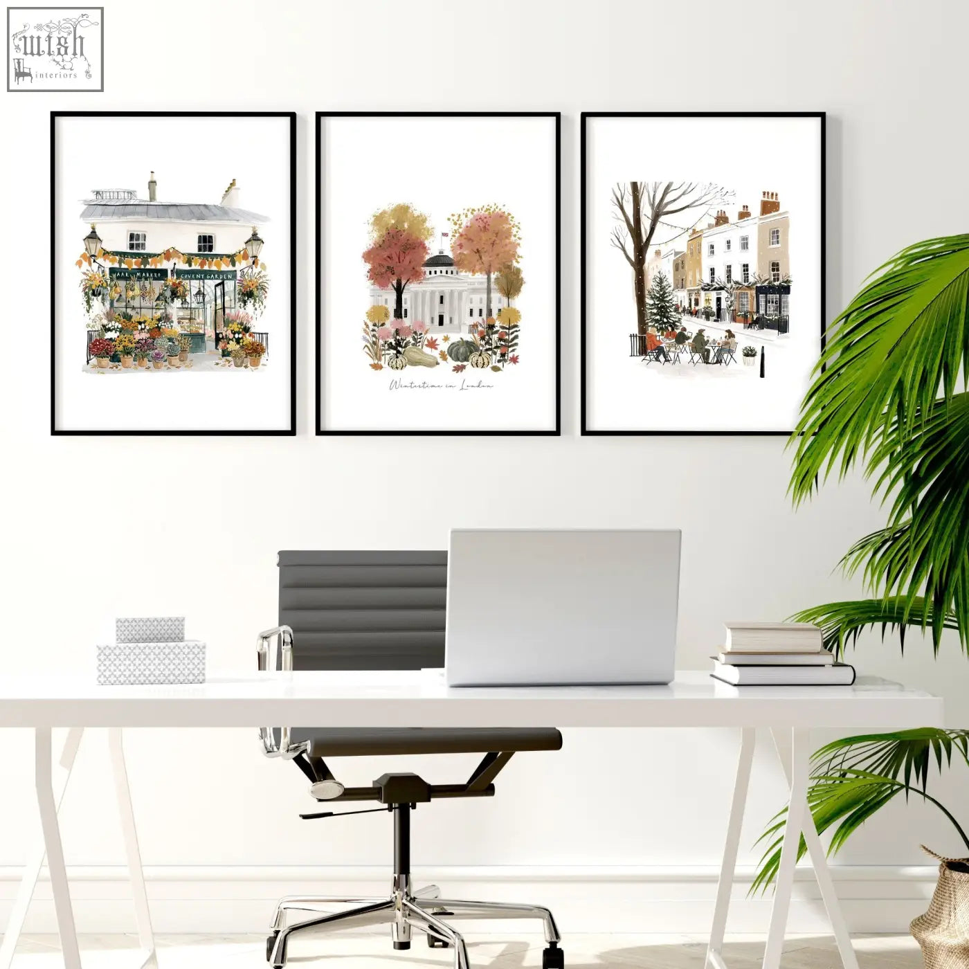 Three framed watercolor london art prints hang above white desk perfect wall decor office travel wall art