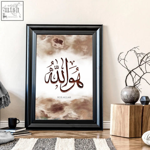 Black-framed wall frame islamic art print with elegant brown he is allah calligraphy on textured beige wall art print