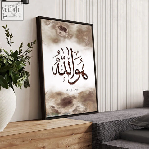 A wall frame islamic art print featuring elegant brown arabic calligraphy on textured beige white background in black frame