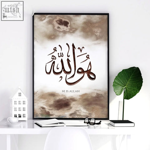 A wall frame islamic art print with elegant brown arabic calligraphy on beige textured background and he is allah text