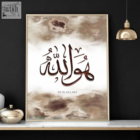 A wall frame islamic art print featuring he is allah calligraphy in brown on beige textured background with gold frame