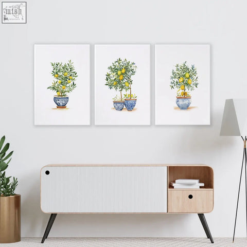 Set of three framed lemon tree art prints in blue and white pots perfect for living room wall hanging
