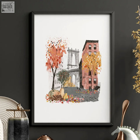 A framed black wall hanging art print of brooklyn bridge with autumn trees and pumpkins perfect travel art print for kitchen