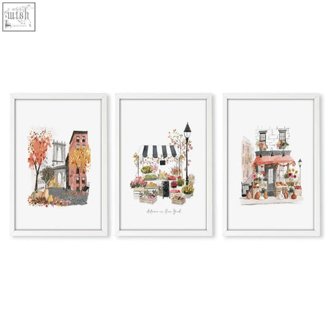 Set of three white framed autumn in new york travel art prints as wall hangings for the kitchen