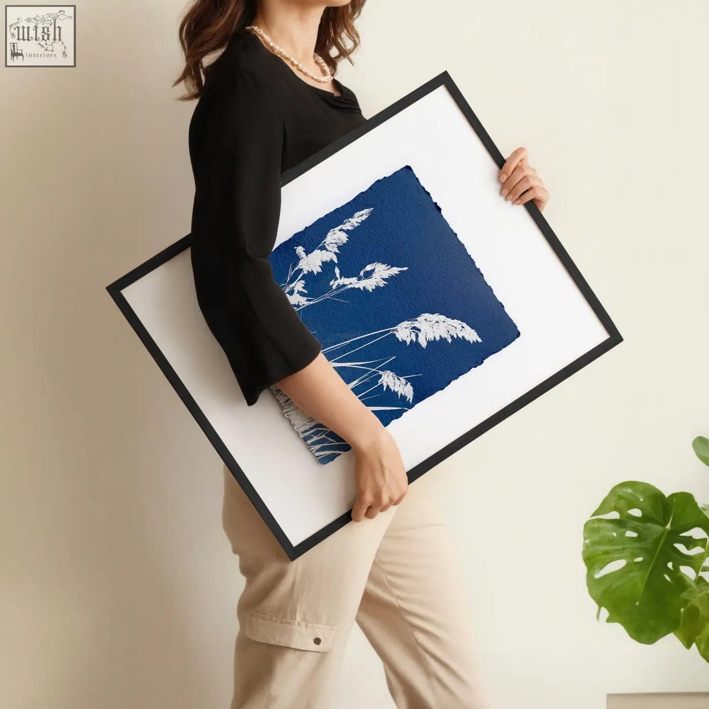 A framed cyanotype botanical wall painting with white grasses on indigo blue background for country cottage decor