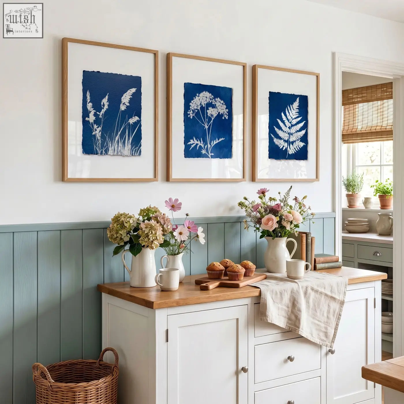 Three framed wall paintings of cyanotype botanical prints with white silhouettes on indigo blue for country cottage decor