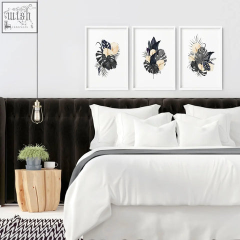 Black velvet tufted headboard with white pillows shown with wall pictures set of 3 framed wall art prints and pink flowers