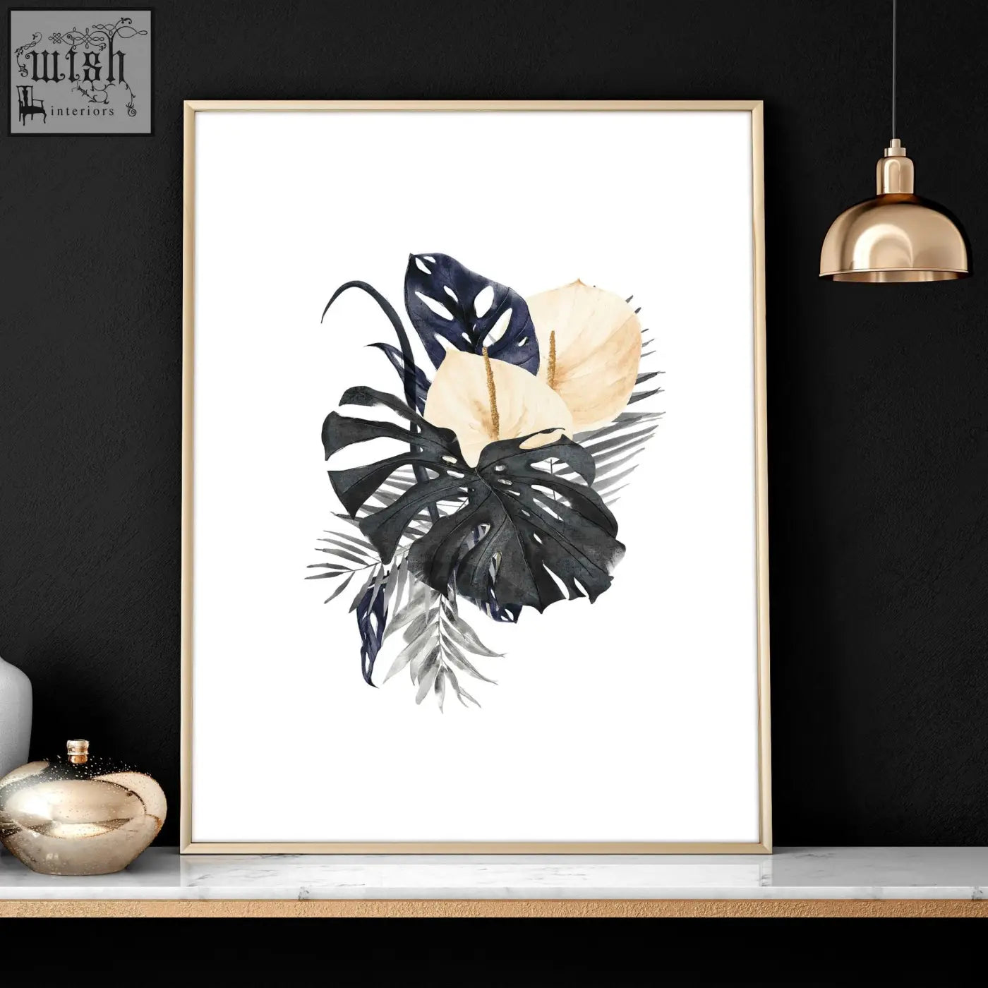 A set of 3 framed wall art prints featuring watercolor tropical leaves in black navy and cream for bedroom wall pictures