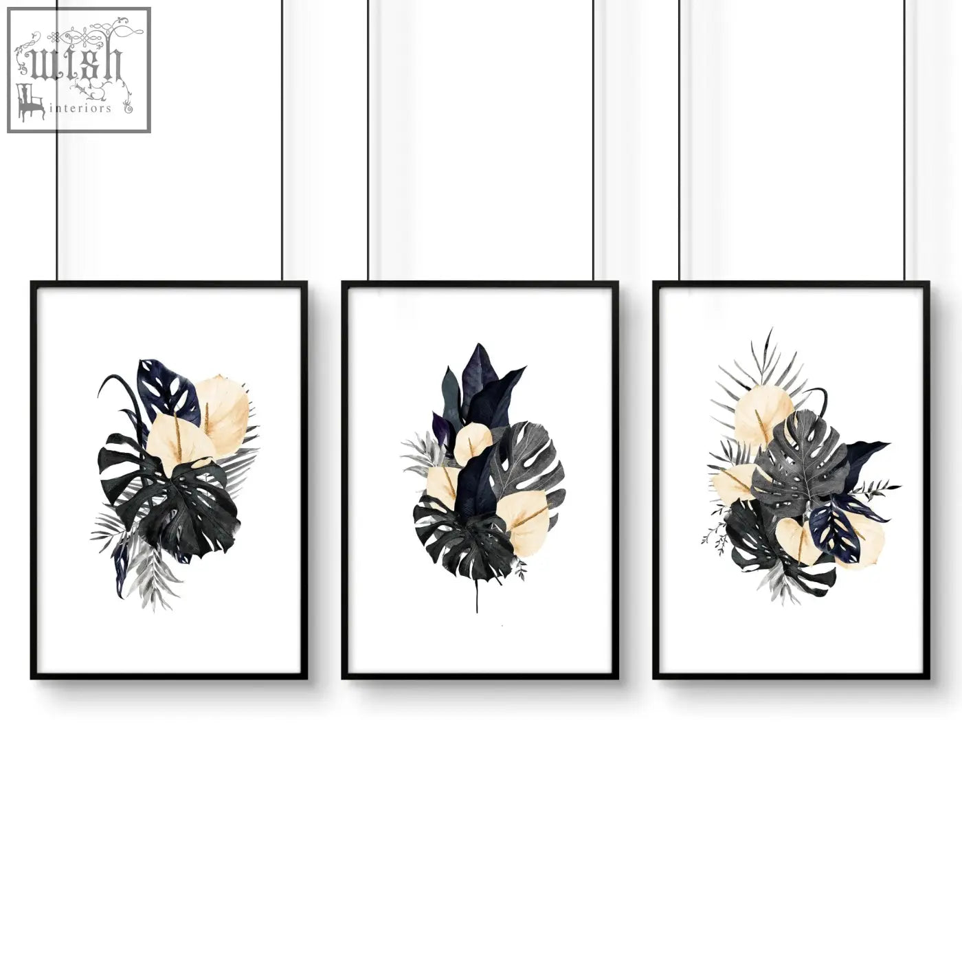 Set of three black and cream tropical leaf wall pictures in minimalist frames perfect as wall art prints for bedroom
