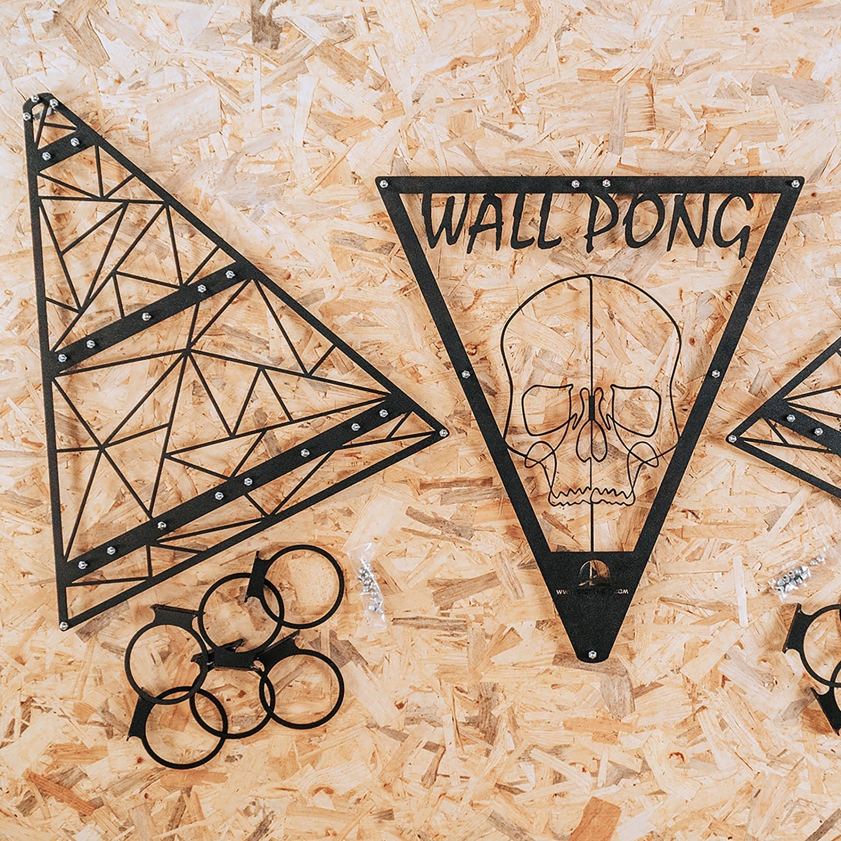 Black metal wall-mounted wall pong drinking game with triangle cups and skull design for aiming opposing teams cups