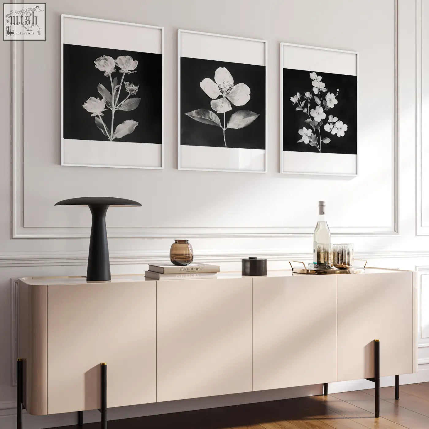 Beige minimalist sideboard with sleek flat-panel doors and black legs paired with white botanical french country wall prints