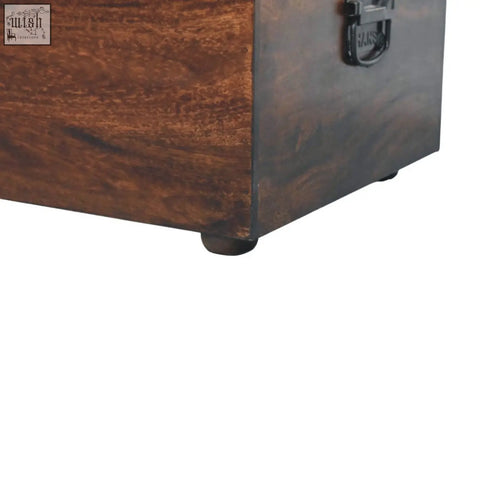 Rustic walnut trunk bench with tan leather seat and dark brown wood finish with black metal hardware