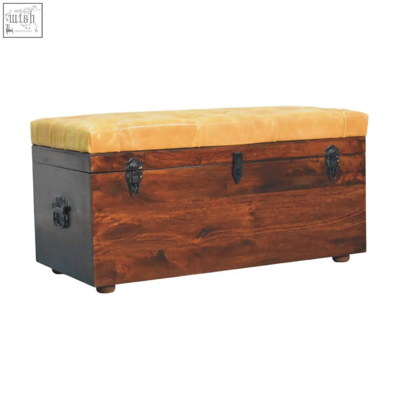Walnut storage trunk bench with tufted tan leather top and rustic wooden body with dark metal latches