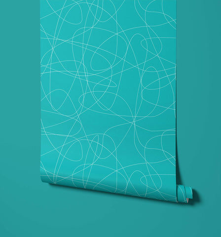 Teal wallpaper called wander with a modern abstract design of interwoven white lines perfect for stylish walls