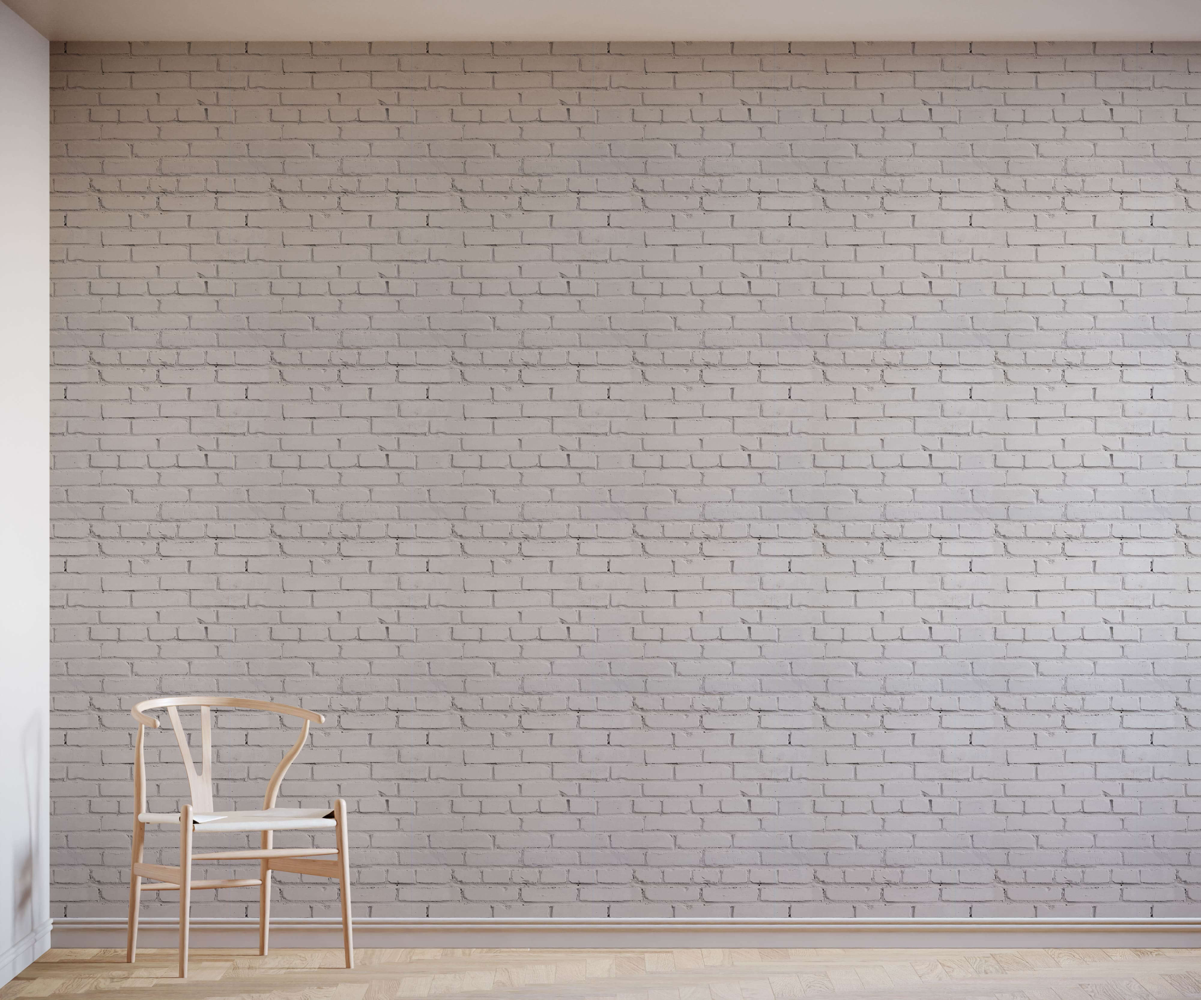 A minimalist white wooden chair with a curved backrest and slender legs from warehouse shown from the back side