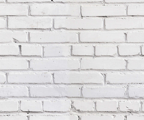 Warehouse white painted brick wall with visible mortar lines and subtle texture for industrial style decor