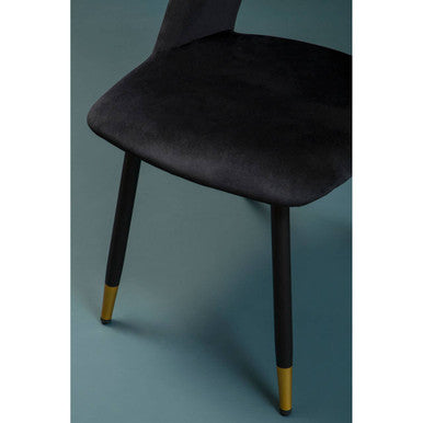 Warren black velvet dining chair with black velvet upholstery and gold tipped legs for stylish seating