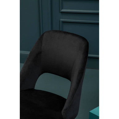 Warren black velvet dining chair with sleek modern design in black velvet perfect for stylish dining spaces