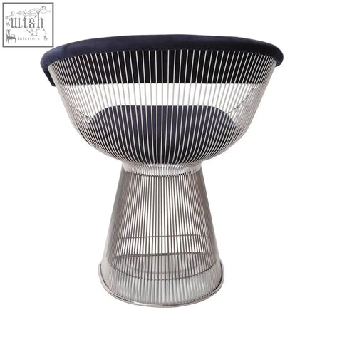 A sleek warren platner dining chair with polished metal wireframe and navy blue upholstered seat and backrest clearance sale