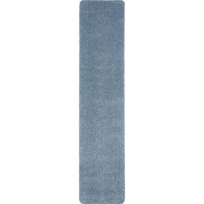 A plush rectangular blue shaggy rug with a soft textured surface that is washable blue and perfect for bathroom use