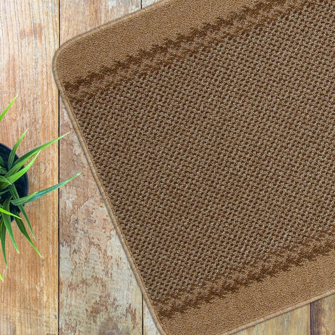 Brown textured washable bordered beige rug with woven pattern and border perfect as a bath mat