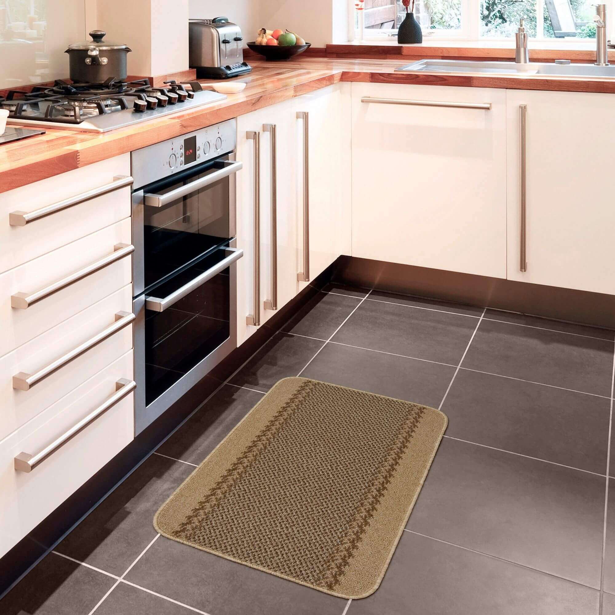 Beige woven washable bordered rug with textured pattern and subtle border detailing perfect for easy cleaning