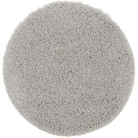 A plush round grey shaggy rug with a soft textured surface in washable ghost grey color