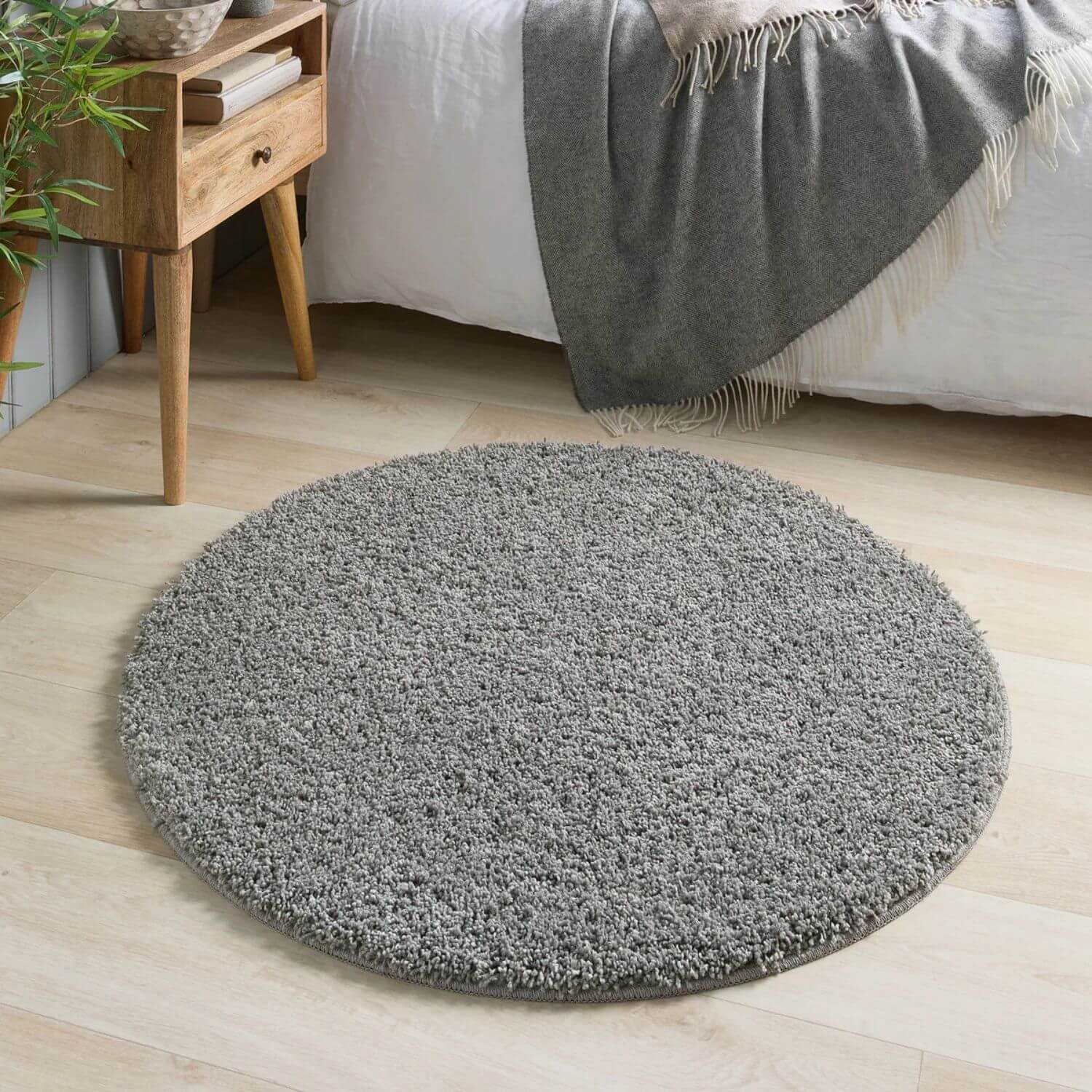 A plush washable ghost grey shaggy rug with a soft textured surface and neatly finished edges perfect for cozy spaces