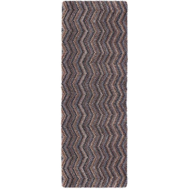 A plush washable mat with a shaggy chevron design in shades of gray and brown perfect for home decor