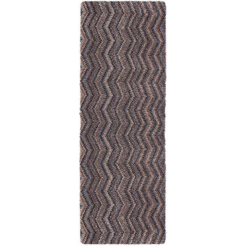 A plush washable mat with a shaggy chevron design in shades of gray and brown perfect for home decor