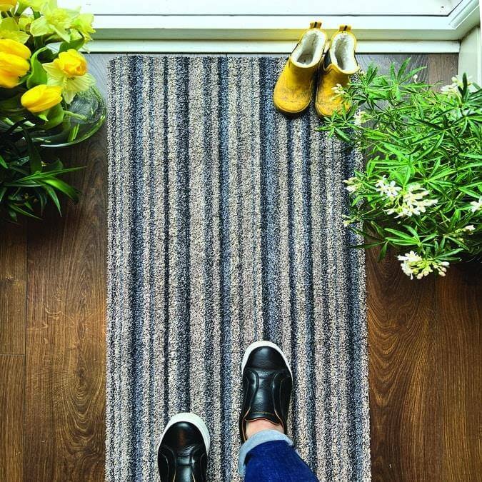 Gray and blue striped washable ribbon mat with textured surface perfect for easy cleaning and durability