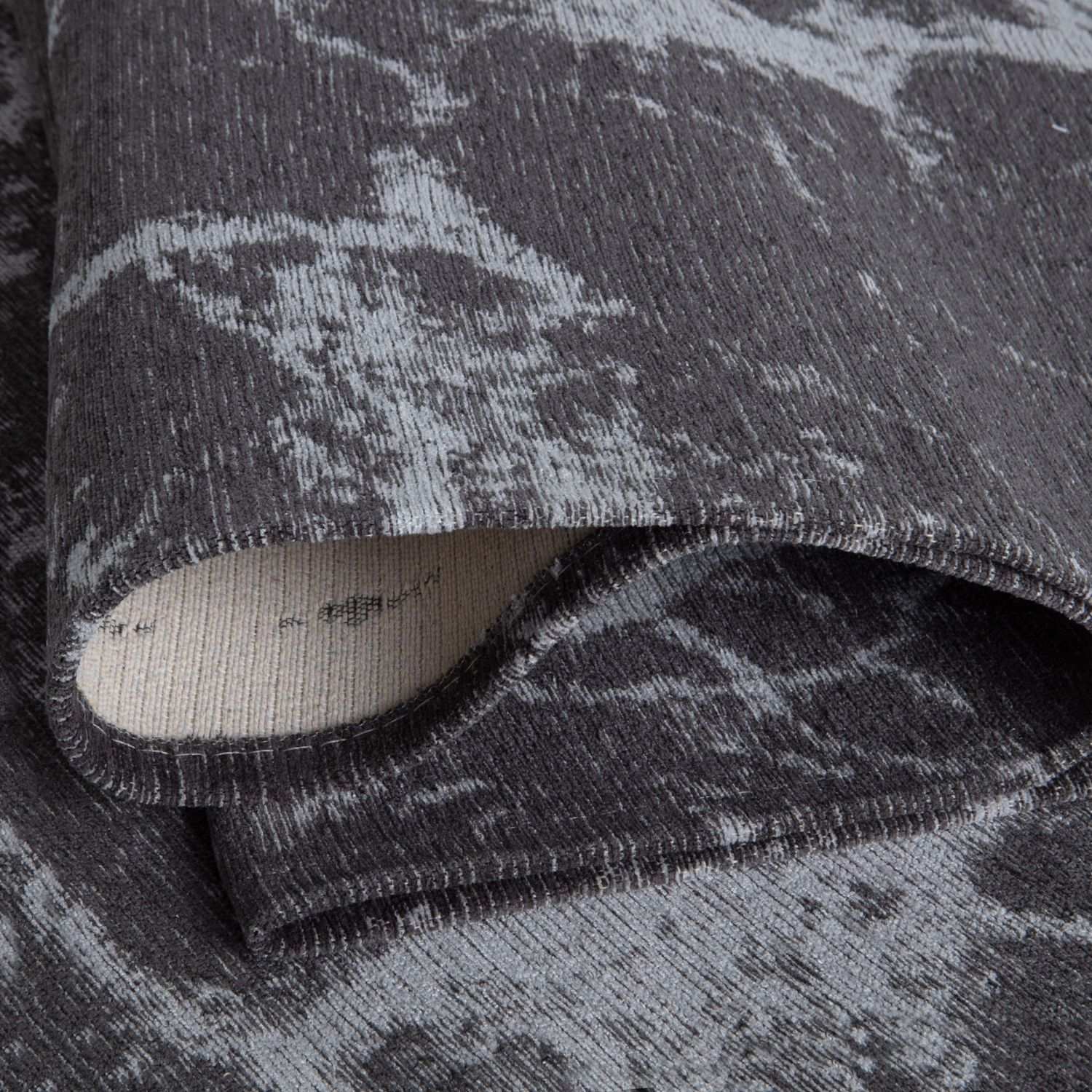 Gray and white abstract patterned washable rug carina dark grey with textured woven surface for easy cleaning