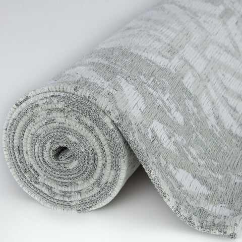 Rolled-up washable rug carina green with gray and white textured abstract pattern perfect green rug choice