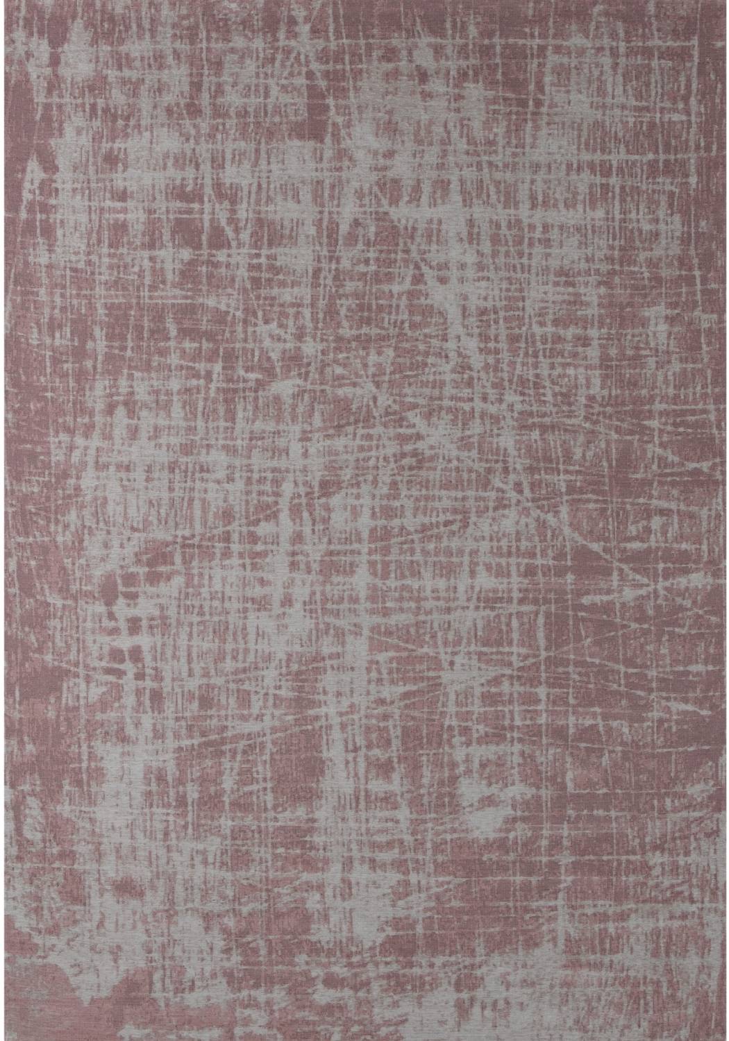 A textured washable rug carina in muted rose pink with a distressed grid pattern perfect for easy care spaces