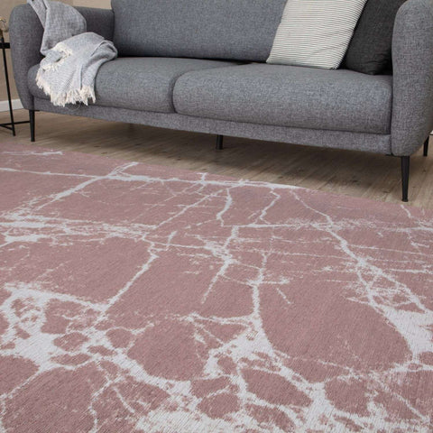Pink marble-patterned washable rug carina with white veining perfect for stylish, easy-care home decor
