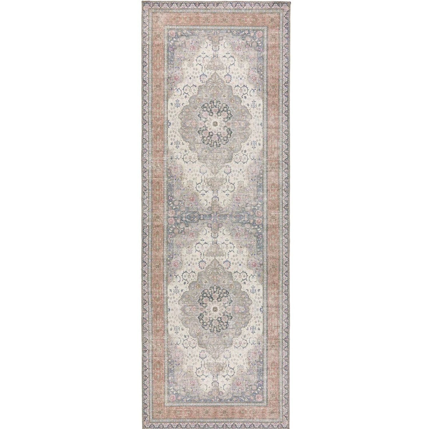 A vintage-inspired rectangular washable rug with a faded eterna medallion design in muted grays and dusty rose tones